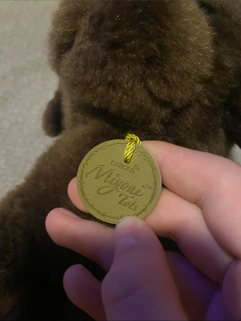 Plush Brown Puppy Stuffed Animal with Gold Tag